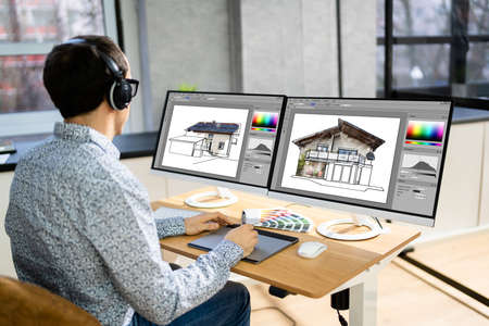 African Graphic Web Designer Using Design Editing Software