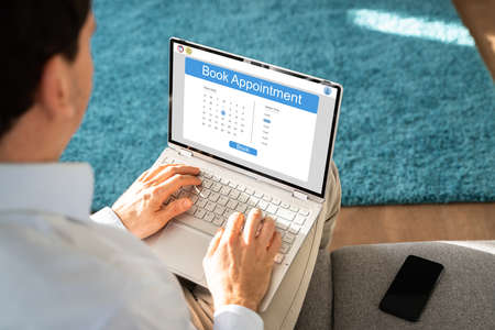 Booking Meeting Calendar Appointment On Laptop Online