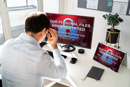 Ransomware Malware Attack. Business Computer Hacked. Files Encryptedの写真素材