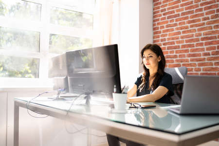 Businesswoman Using Business Computer In Office Or Workplaceの写真素材