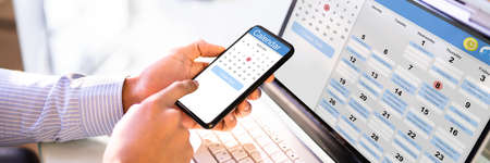 African American Doing Calendar Schedule Planning. Business Agenda In Officeの写真素材