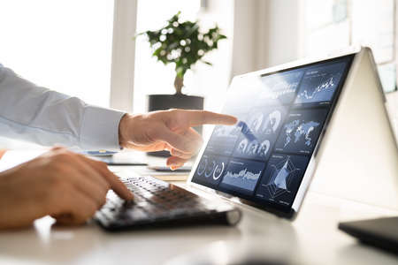 KPI Analytics Dashboard And Graph On Laptop Screen