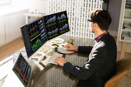 Man Trading Stock Market Exchange Online On Computer Screen