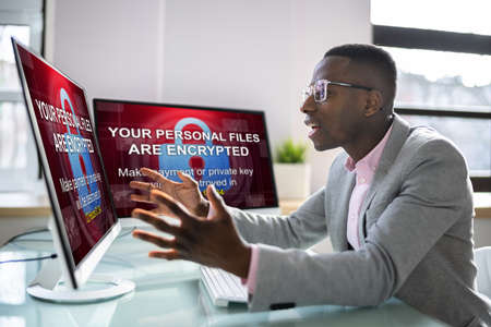 Ransomware Malware Attack. Hacked Business Computer. Cyber Security Breachの写真素材