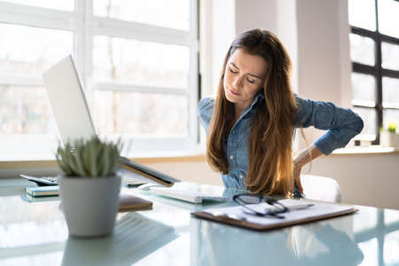 Back Pain Bad Posture Woman Sitting In Office