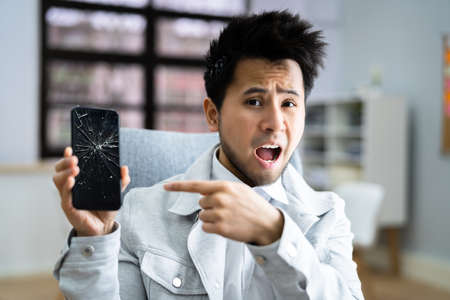 Broken Cracked Mobile Phone Screen. Smartphone Repairの写真素材