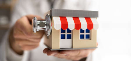 Doctor Doing Small Business Inspection. House Property Checkの写真素材