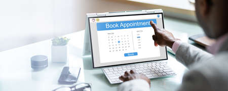 Booking Meeting Appointment On Laptop Computer Online