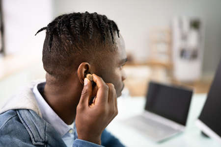Hearing Aid And Audiology. Man With Disability