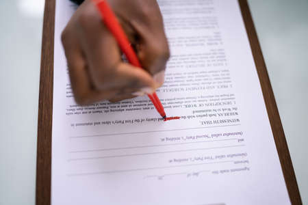 Insurance Paycheck. Payroll Check. Hand Writing Chequeの写真素材