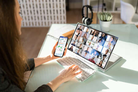 Remote Conference Webinar And KPI Dashboard Chart On Computer