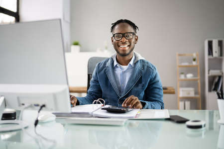 Accounting Bookkeeper Clerk Man. Bank Advisor And Auditorの写真素材