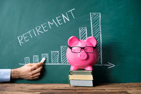 Teacher Planning Retirement In School. Investment Fundの写真素材