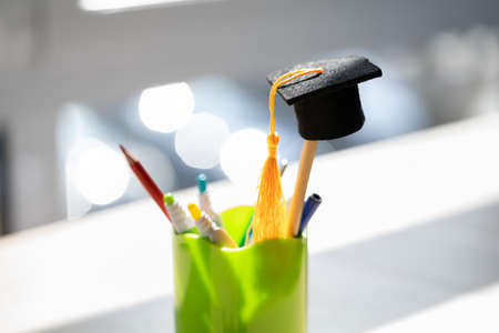 Photo Of College Graduation Hat On Pencilの写真素材