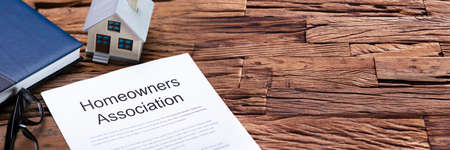 House Model Near HOA Rules And Regulations Documentの写真素材