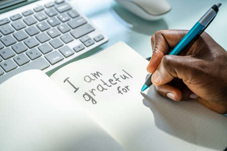Gratitude Journal Concept. Writing I Am Grateful In Journal