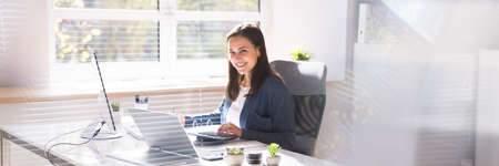 Professional Accountant Woman In Office Doing Accounting And Budget