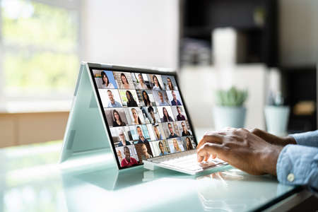 Virtual Video Conference Meeting Chat On Hybrid Laptopの写真素材