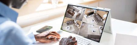 CCTV Security System Footage On Tablet Computer
