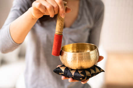 Tibetan Sound Bowl. Buddhism And Meditating Therapy