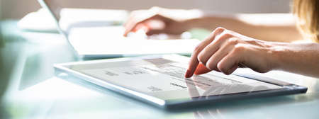Digital Electronic Bill And Accountant E Invoice On Tablet