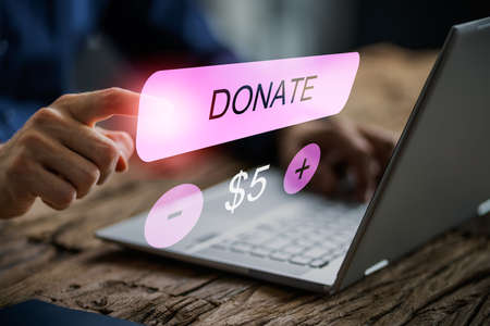 Donate Money Online. Donation Payment On Laptop