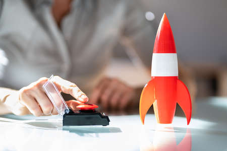 Red Launch Button. Businesswoman Rocket Career Startの写真素材