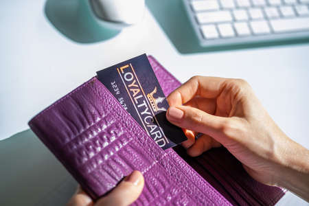 Loyalty Reward Points Program Card In Hand