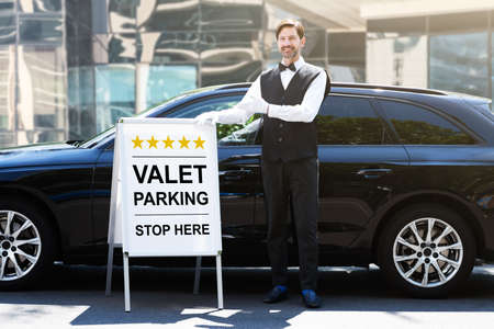 Valet Parking Hotel Service. Man Driver Standingの写真素材