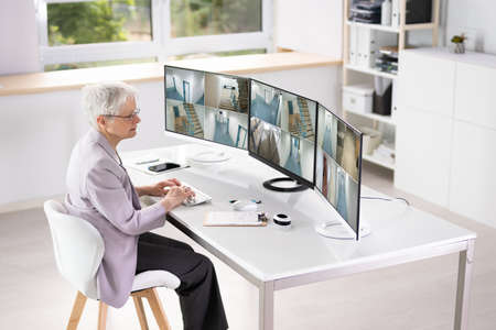CCTV Security Footage On Multiple Computer Monitors