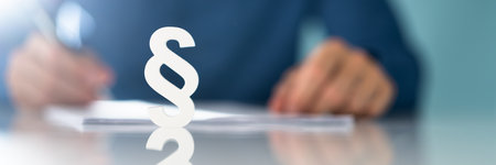 Law Paragraph And Paper Bill On Accountants Desk