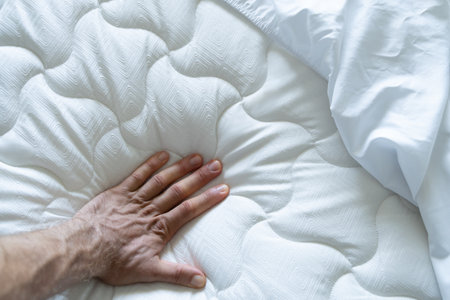 Hand Testing Orthopedic Memory Foam Core Mattressの写真素材