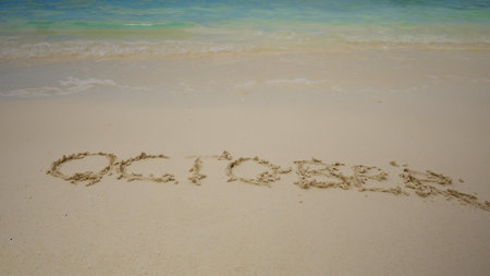 October Calendar Year Beach Inscription On Sandの写真素材