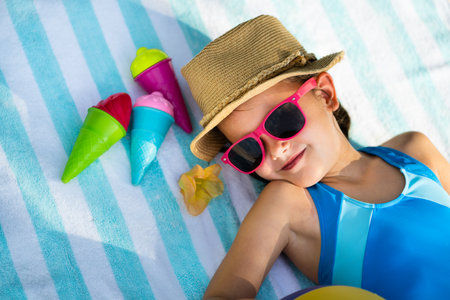 Child Person In Sunglasses On Beach Outdoorsの写真素材