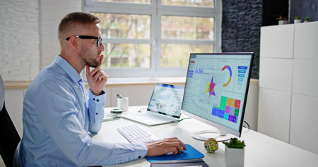 KPI Business Analytics Dashboard On Desktop Computer