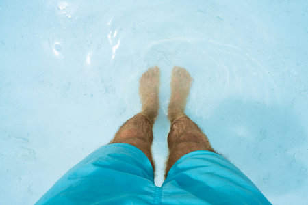 Outdoors Beach Travel. Person POV Feet In Waterの写真素材