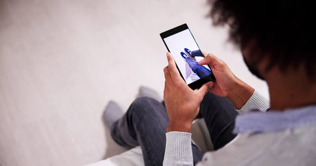 Man Trying Virtual Sneakers In Shop Or Store AR App