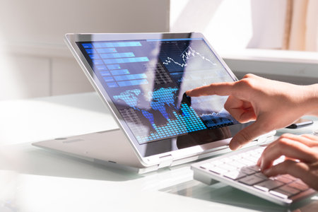 Financial Data Analyst Female Using KPI Dashboard On Laptop