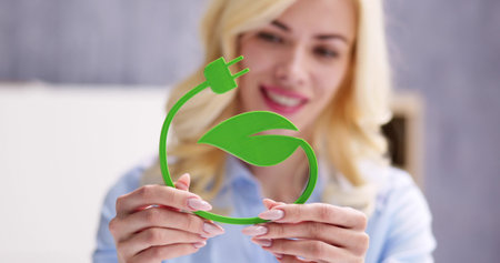 Woman Holding Renewable Green Energy Concept In Handの写真素材