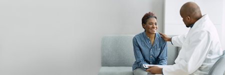 Doctor Talking With Elderly African Patient. Elder Healthcareの写真素材
