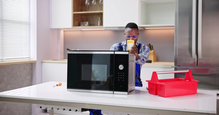 Repair Microwave Fix Appliance Technician Domestic Kitchenの写真素材