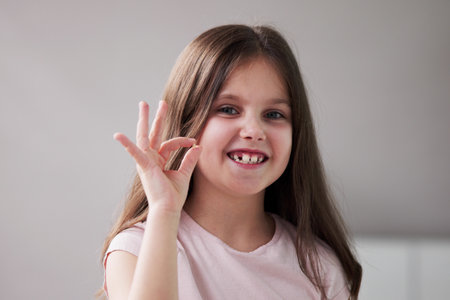 Kid With Milk Teeth. Child Without Tooth