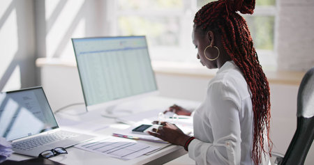 E Invoice Tax Software On Female Accountant Computerの写真素材