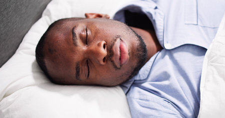 African American Man With Sleep Apnea Snoringの写真素材