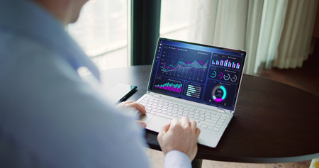 KPI Business Analytics Data Dashboard. Analyst Using Computer