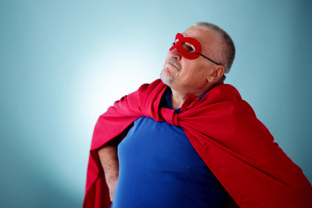 Unusual Funny Superhero. Cartoon Character In Mask Successの写真素材