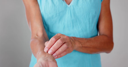 Skin Psoriasis And Rash. Scratching Dry Armの写真素材