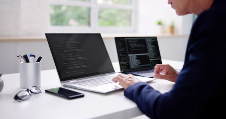 Overemployed Woman Working Two Full Time Jobsの写真素材