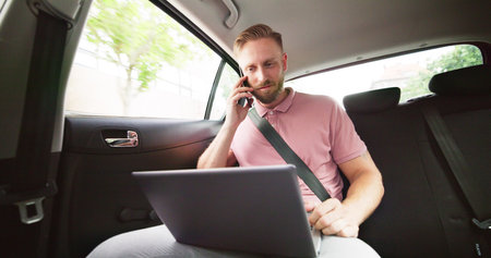 Executive Business Man In Luxury Car Taxiの写真素材