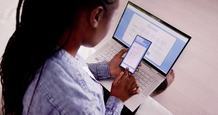African Woman Filling Survey Poll Or Form On Mobile Phone